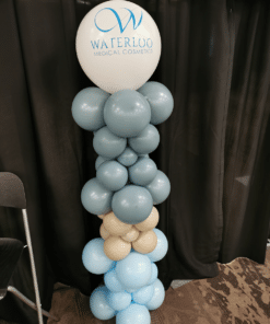 Balloon column with adorned with a large balloon and custom decal.