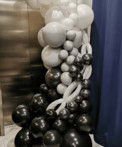 Black and silver balloon column.