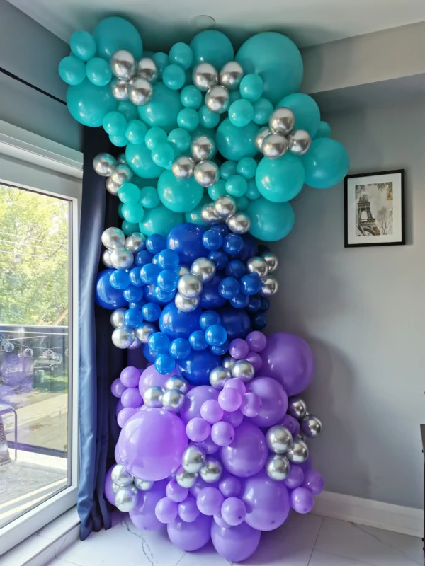 Purple, blue, and silver balloon garland.