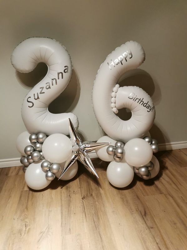 White and silver "26" number stack.