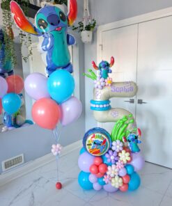 Stitch-themed balloon bouquet and number stack featuring tropical decorations, customizable colours, and personalized decals in a vibrant party setup.