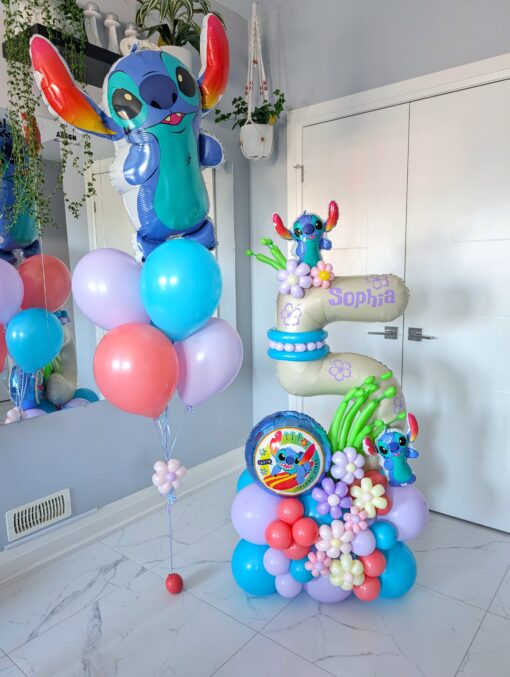 Stitch-themed balloon bouquet and number stack featuring tropical decorations, customizable colours, and personalized decals in a vibrant party setup.