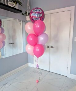 Mother’s Day balloon bouquet with pink and light purple latex balloons and a foil "Happy Mother’s Day" balloon on top, tied to a pink water weight.
