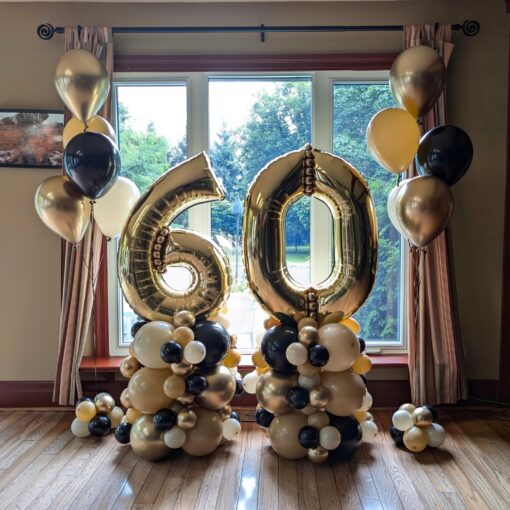 Custom balloon number stack with one large air-filled digit and a deluxe balloon base. Numbers and colours fully customizable.