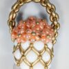 Balloon basket with white and gold balloons, topped with removable peach balloon flowers with gold centres, featuring a gold balloon handle.