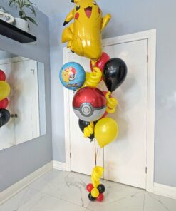 Pokémon Pikachu themed helium balloon bouquet with Poké Ball balloon and red yellow black balloons.