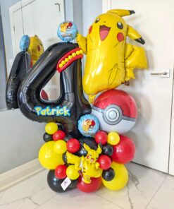 Pokémon themed balloon number stack with Pikachu balloons, Poké Ball accents, red yellow and black balloons, and personalized name decal. ⚡