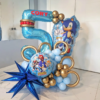 Sonic themed balloon number stack with blue balloons, gold ring accents, character balloons, and personalized name decal for a gamer birthday party. 🌀💙