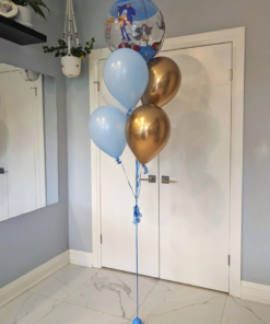 Sonic the Hedgehog themed helium balloon bouquet with Sonic orb balloon and blue and gold balloons.