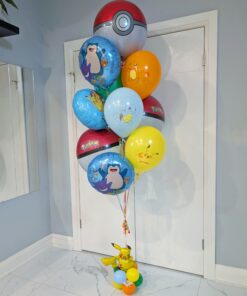 Pokémon helium balloon bouquet with Poké Balls, Pikachu, Snorlax, Charmander, Squirtle, and a colourful balloon base.