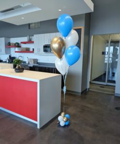 Blue, white, and reflective gold helium balloon bouquet with a coordinating balloon base.