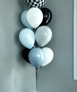 Checkered birthday balloon bouquet with black, white, and soft blue latex balloons.