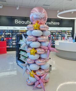 Latex-free rose gold and silver foil balloon column with metallic starbursts, gold stars and a branded topper.