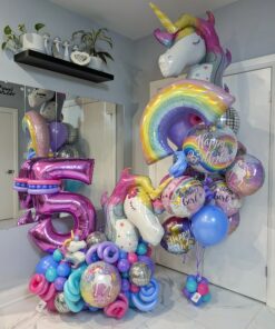 Unicorn birthday balloon combo with personalized number stack, rainbow balloons and colourful unicorn helium bouquet.