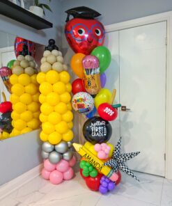 Two-piece back-to-school balloon bundle with a giant pencil column and personalized school-themed balloon display.